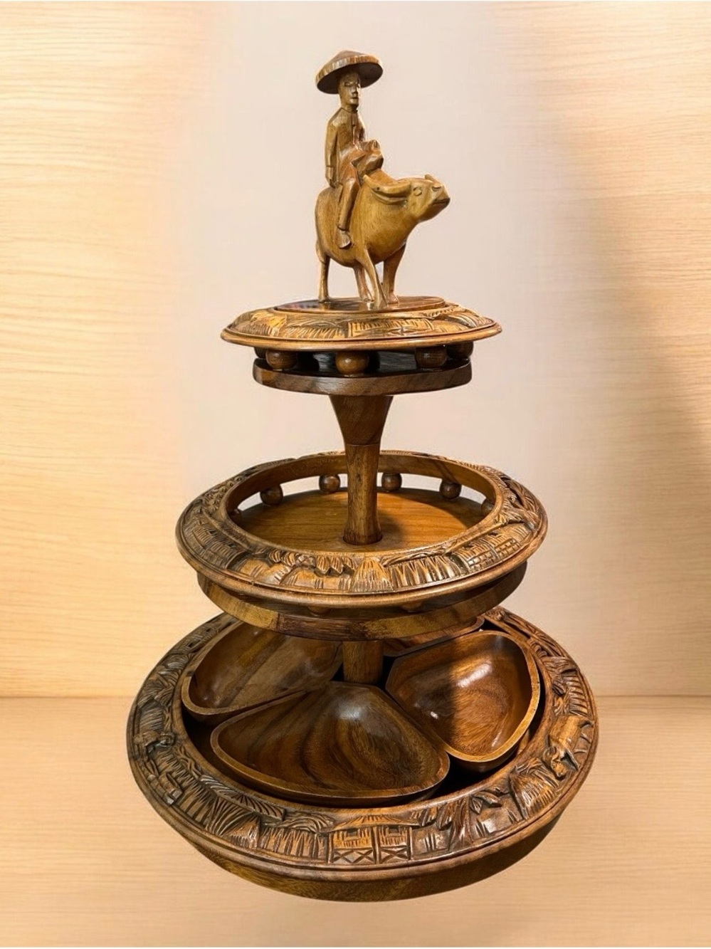 vintage 1960s Southeast Asian hand-carved wooden three-tier lazy susan tower..